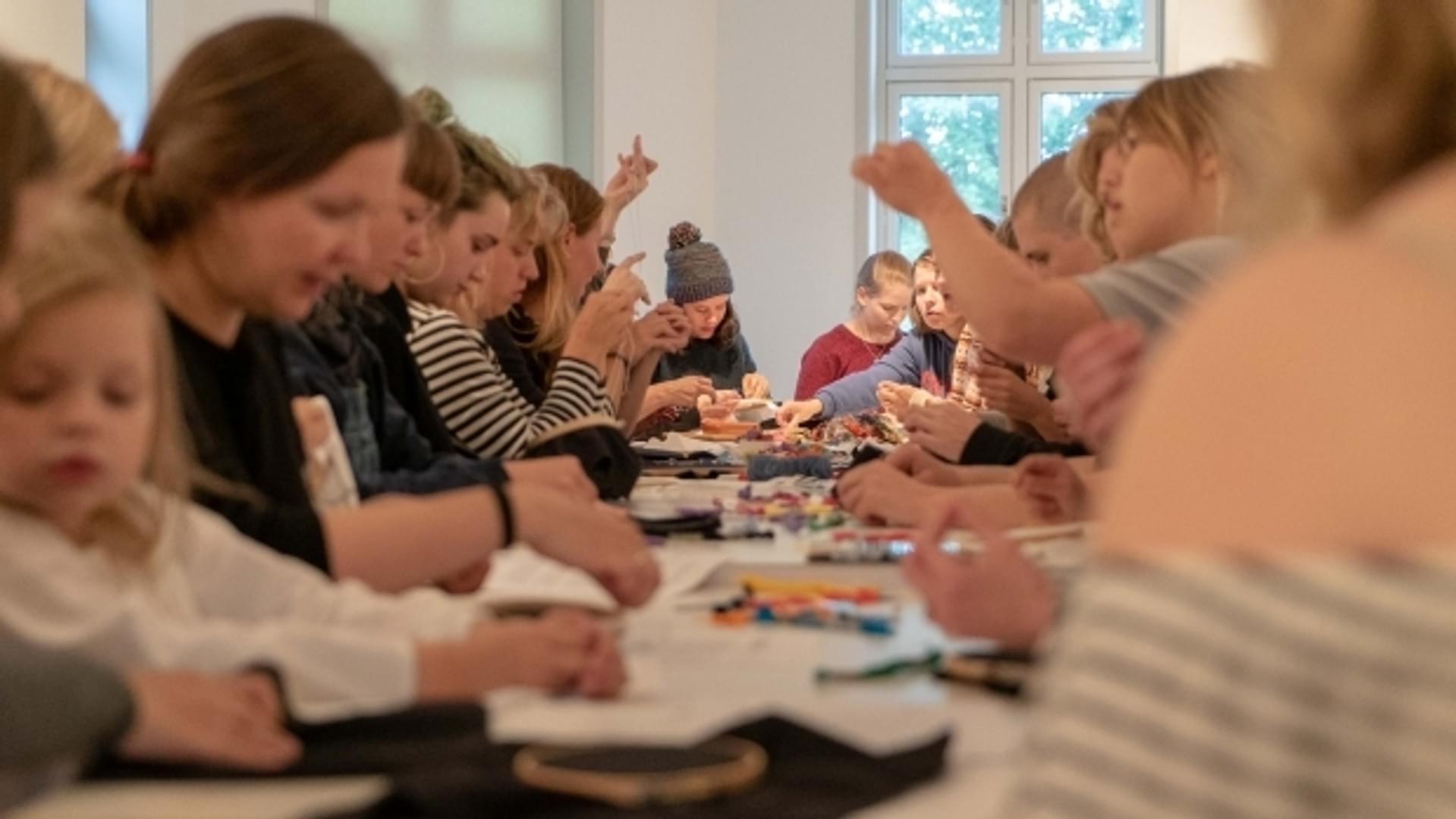 An example of the offers at HOS: embroidery workshop